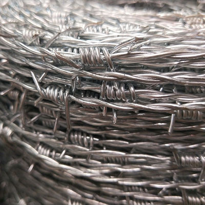 Low Carbon Steel Farm Concertina Barbed Wire Fencing High Speed PVC Coated